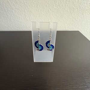 Gaudi' signed ocean wave themed silver tone with blue enamel earrings. PO